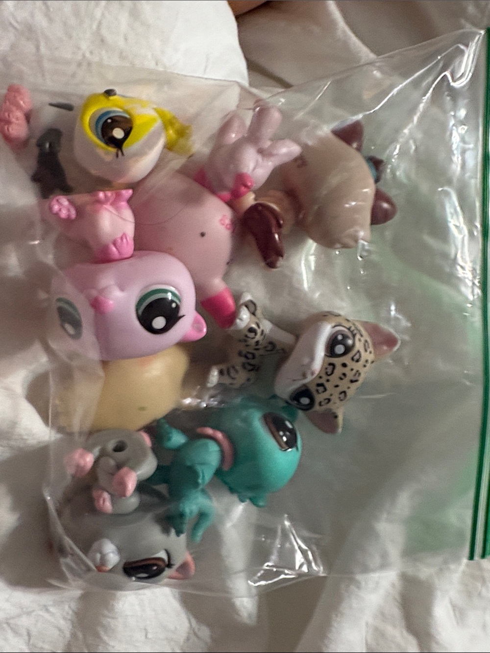 Assorted Small Pet Figurine Lot - Pink, Teal, Yellow, Beige